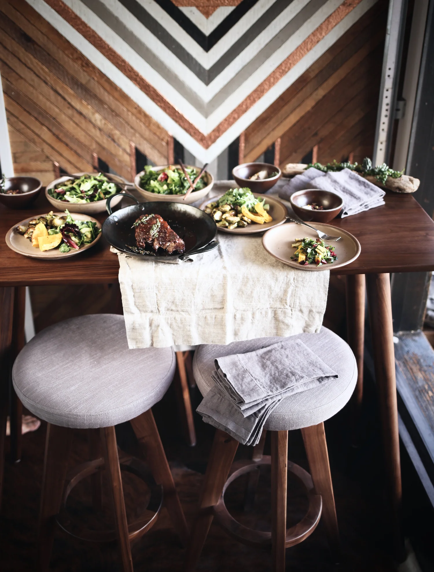 Preparing a meal in the tiny house kitchen